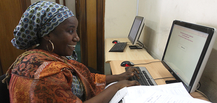 African woman at computer