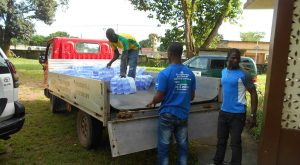 Distributing fresh water to families [Photo credit: Moses Khanu]