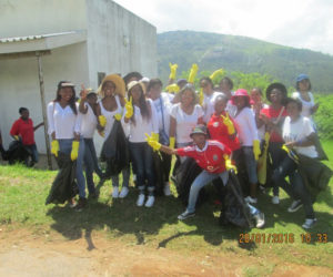 Young women, members of the HC3 Young Women’s Empowerment Program in Swaziland, participate in a Community Clean up Campaign they organized for their area. 