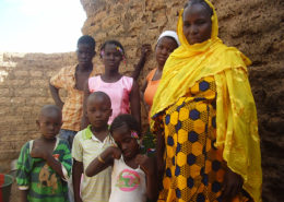 A high-parity woman in West Africa with her six children