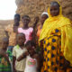 A high-parity woman in West Africa with her six children