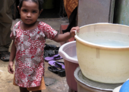 Credit: A young girl in Kolkata, India, stands by her family's cholera-contaminated water supply.